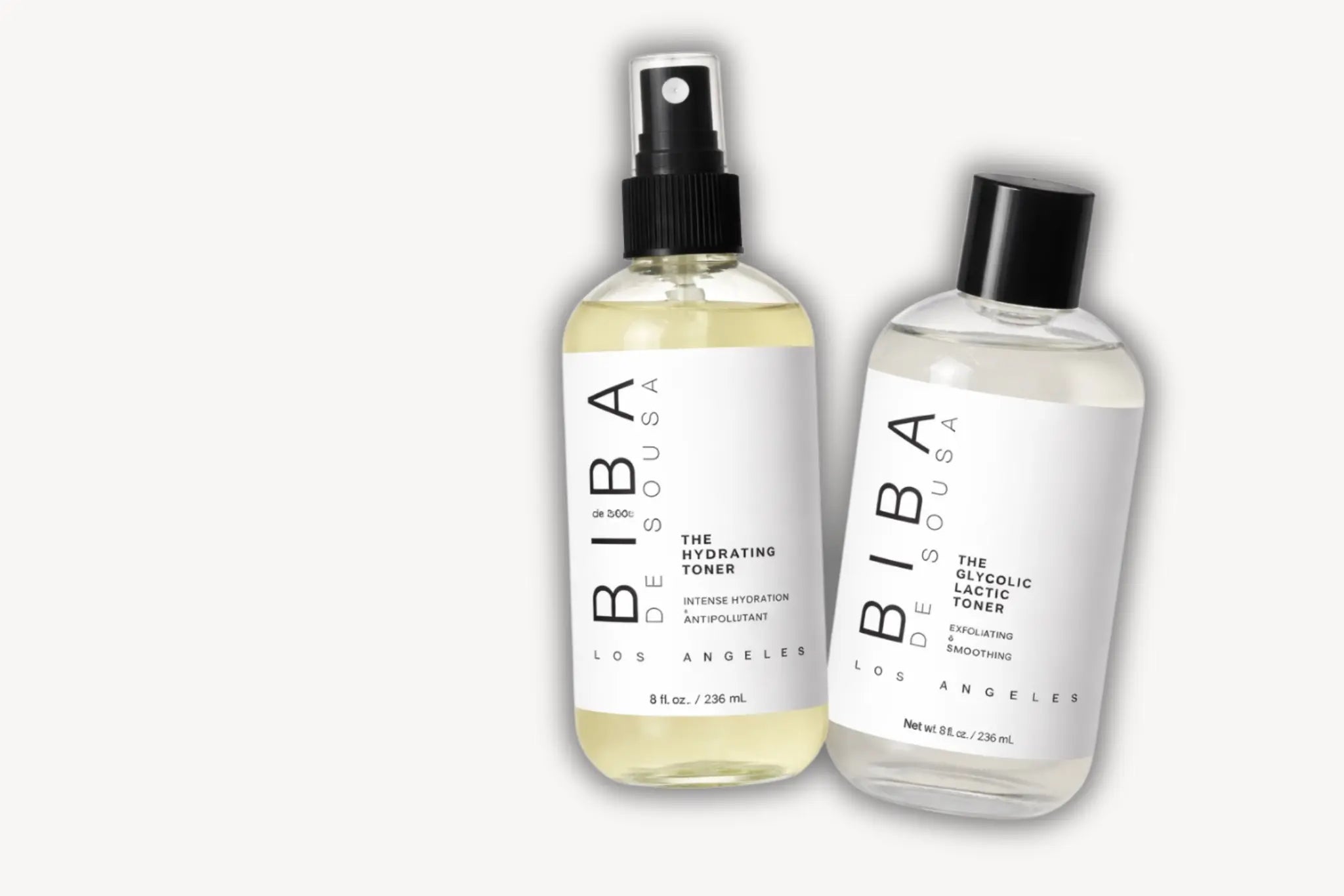 Hydrating Toner and Glycolic Lactic Toner bottles by BIBA de Sousa Los Angeles on a clean white background, shown side by side with labels clearly visible