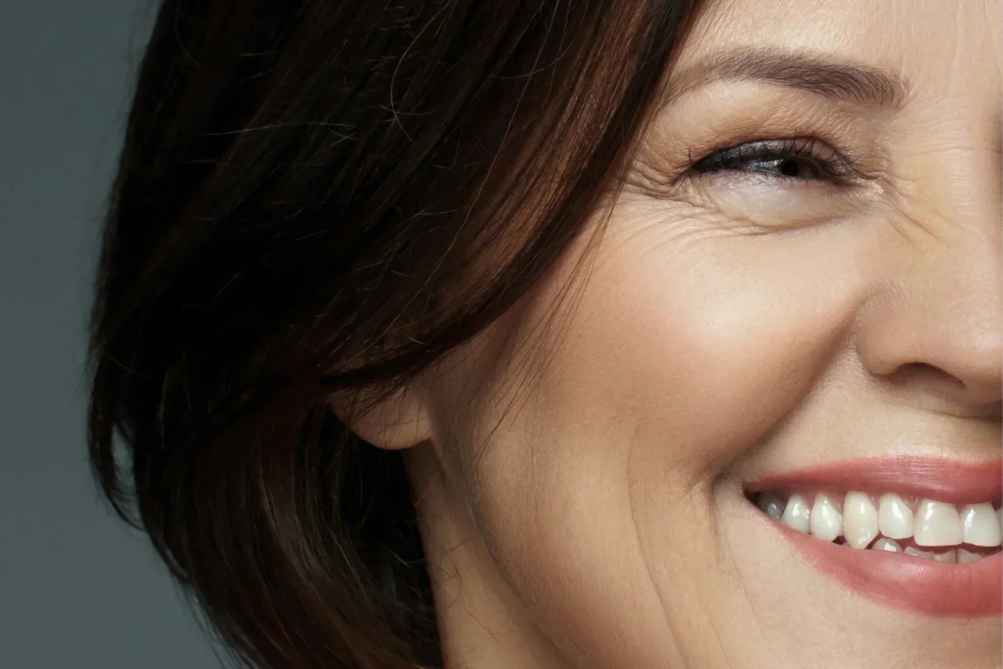 Close-up of mature skin showing natural texture and fine lines, illustrating how aging affects skin health and microbiome balance