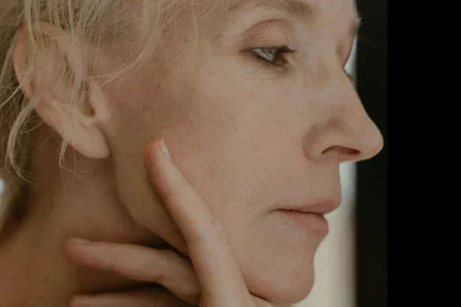 Side profile of mature skin showing natural fine lines and texture, illustrating age-related skin changes