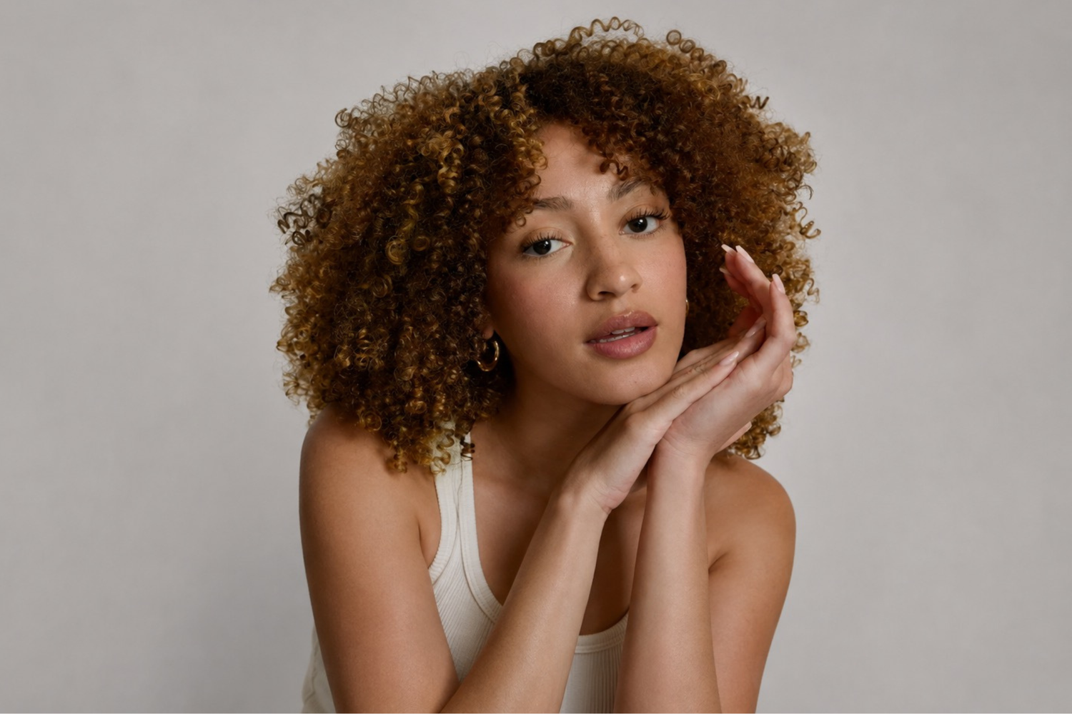 Woman with healthy, hydrated skin representing a strong and balanced skin barrier.