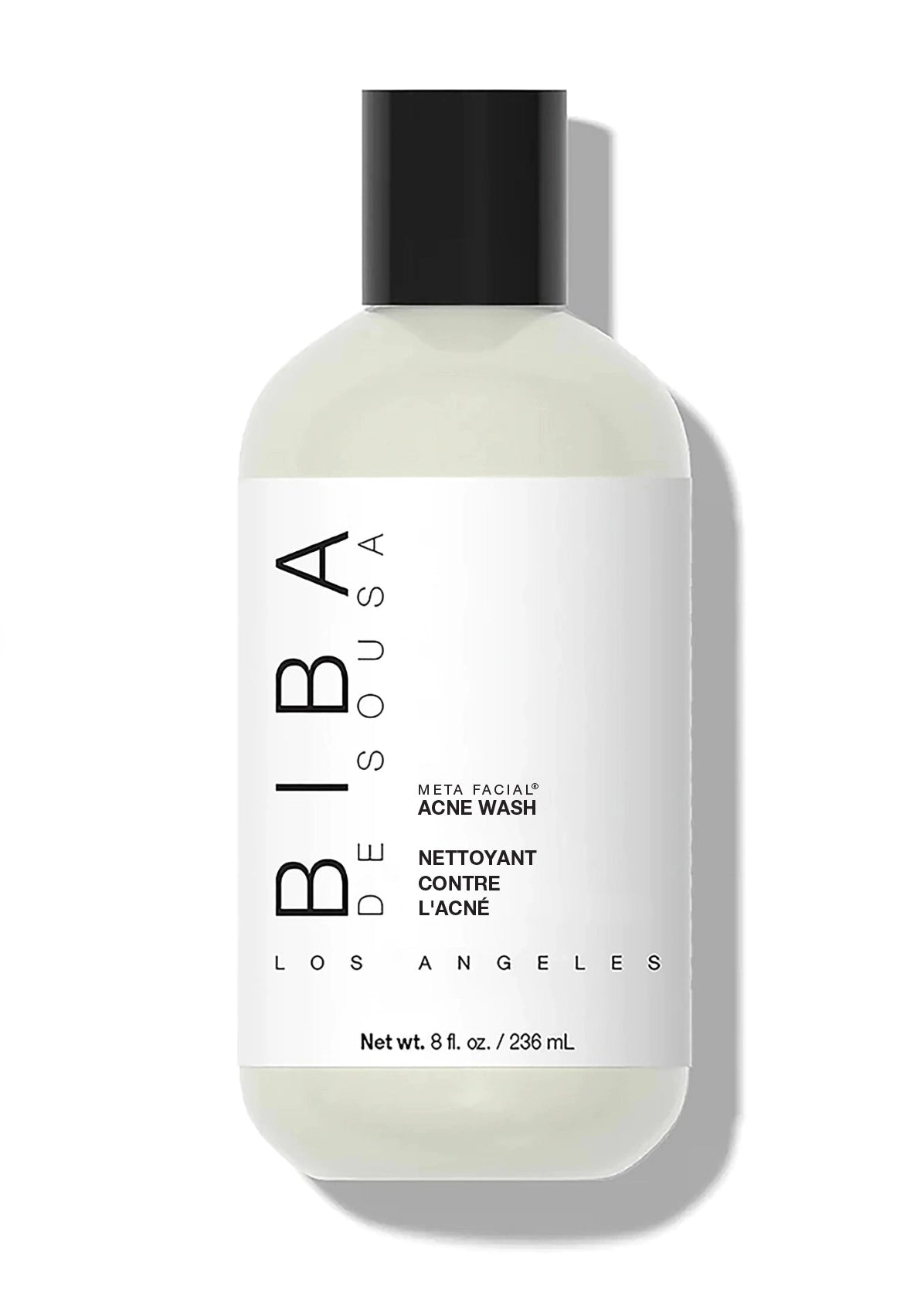 META FACIAL® Acne Wash by Biba Los Angeles in white bottle with black cap on light gray background, acne cleanser designed to support clearer-looking skin and reduce visible congestion.