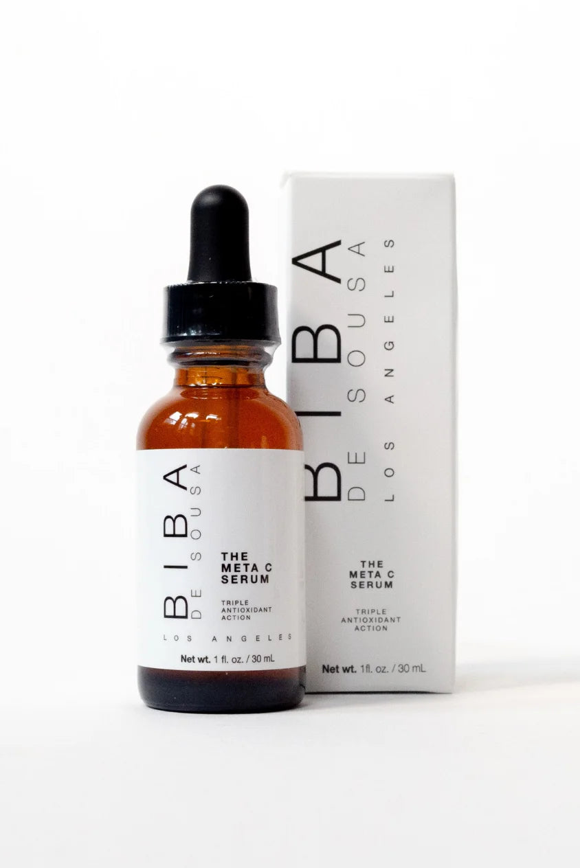 Amber glass dropper bottle of BIBA Los Angeles Meta C Serum shown with outer packaging.